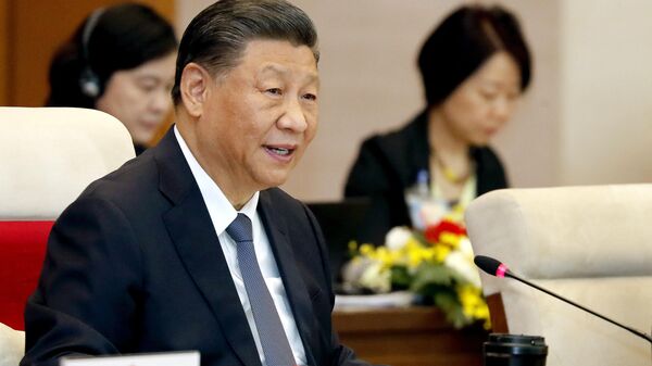O presidente da China, Xi Jinping durante uma reunião na Assembleia Nacional em Hanói, em 13 de dezembro de 2023 - Sputnik Brasil