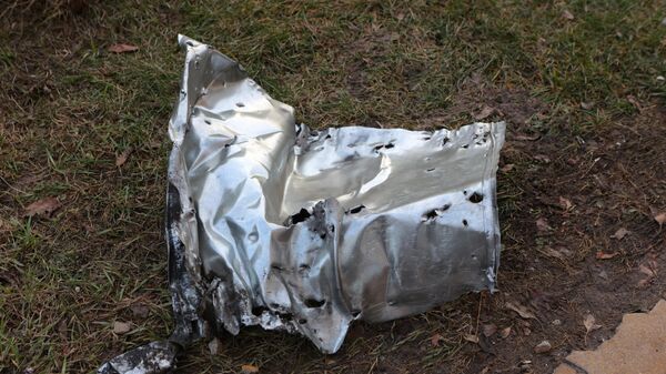 Fragmento de projétil que caiu em Belgorod, na Rússia, após bombardeio ucraniano, em 30 de dezembro de 2023 - Sputnik Brasil