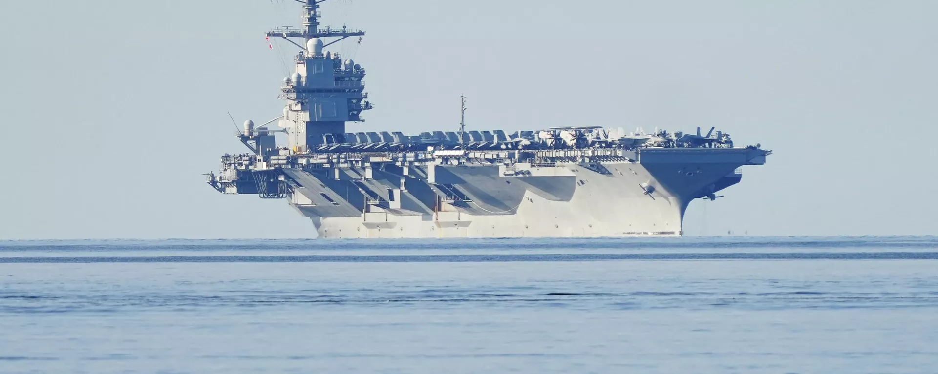 Porta-aviões USS Gerald R. Ford dos EUA navegando perto da ilha de Jeloya, em Moss. Noruega, 24 de maio de 2023 - Sputnik Brasil, 1920, 17.01.2024