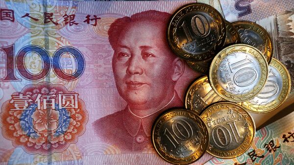 Rublo e yuan, moedas da Rússia e China - Sputnik Brasil