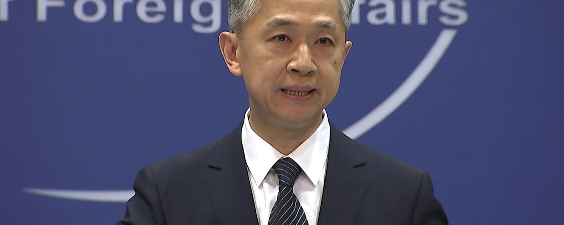 O porta-voz do Ministério das Relações Exteriores da China Wang Wenbin fala durante o briefing diário em Pequim, em 11 de junho de 2021 - Sputnik Brasil, 1920, 05.01.2024