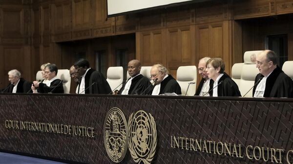 Juízes do Tribunal Internacional de Justiça (TIJ) presidem a abertura das audiências da denúncia sul-africana de Israel por atos de genocídio na Faixa de Gaza. Países Baixos, 11 de janeiro de 2024 - Sputnik Brasil