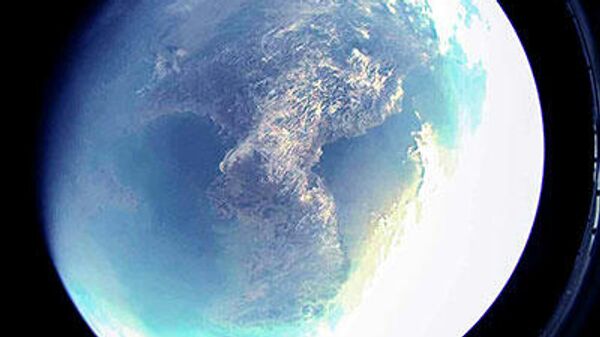 Imagem tirada da câmera a bordo do foguete norte-coreano realizando teste de satélite - Sputnik Brasil