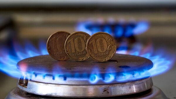 Moedas de 10 rublos em um fogão a gás (foto de arquivo) - Sputnik Brasil