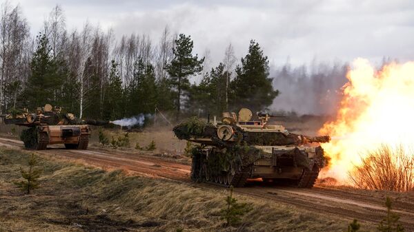 Tanques M1 Abrams durante o exercício militar internacional Summer Shield XIV na Letônia - Sputnik Brasil