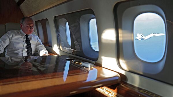 Presidente russo, Vladimir Putin, durante a viagem à base aérea de Hmeymim na Síria - Sputnik Brasil