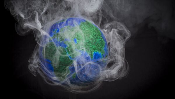 Pequeno globo rodeado por fumaça para ilustrar aquecimento global, França, 10 de novembro de 2015 - Sputnik Brasil