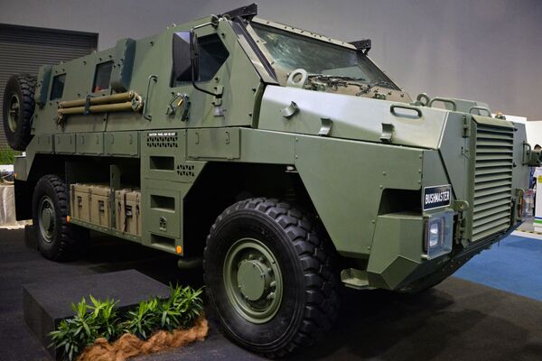 Veículo blindado de transporte de pessoal Bushmaster, desenvolvido pela empresa australiana ADI - Sputnik Brasil