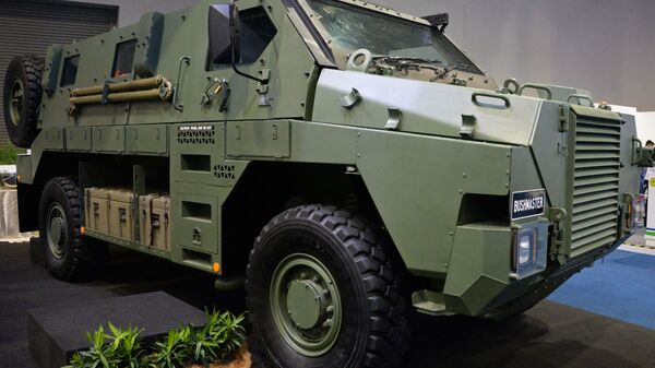 Veículo blindado de transporte de pessoal Bushmaster, desenvolvido pela empresa australiana ADI (imagem de referência) - Sputnik Brasil