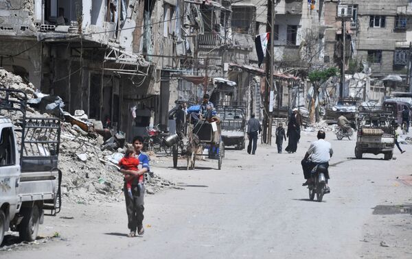 Cidade síria de Douma, nos arredores de Damasco, após ser libertada dos militantes. - Sputnik Brasil