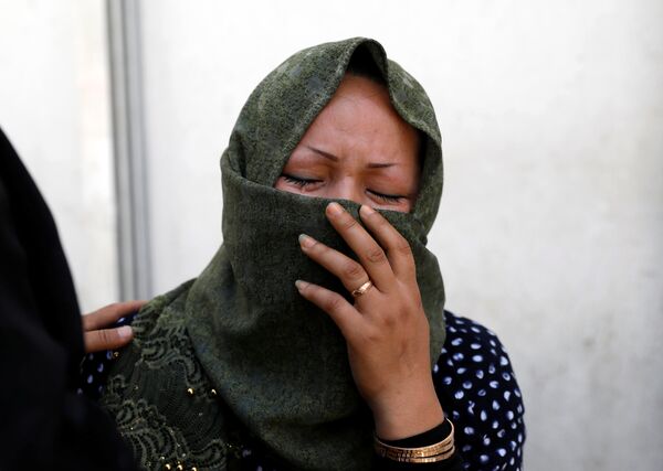 Uma mulher chora em um hospital depois de um ataque suicida em Cabul, no Afeganistão. - Sputnik Brasil