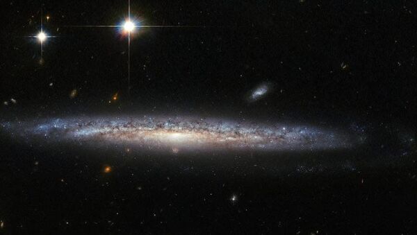 Foto da galáxias NGC 5714 e NGC 1787 tirada pelo Telescópio Hubble da NASA - Sputnik Brasil