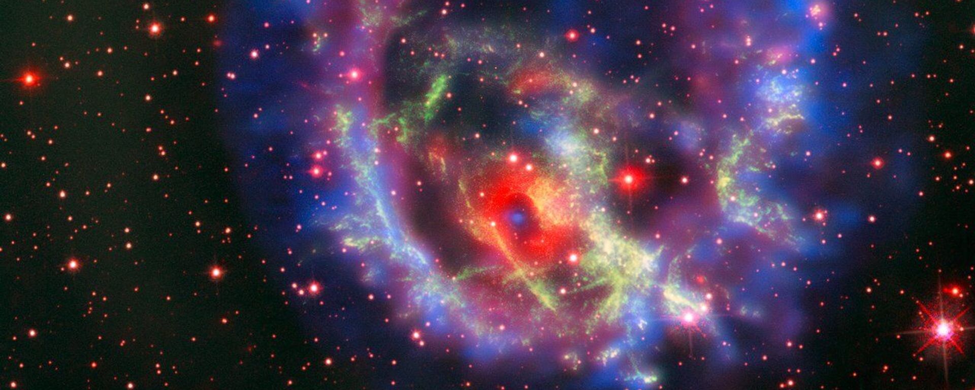 Partículas de gás formando supernova remanescente 1E 0102.2-7219 - Sputnik Brasil, 1920, 01.06.2022