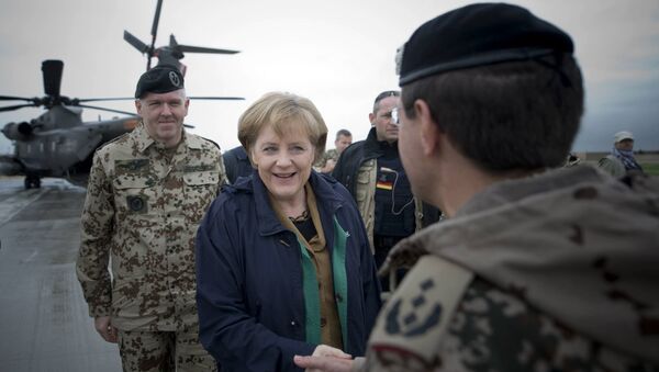 Angela Merkel bei Besuch der Bundeswehr-Truppen in Afghanistan (Archivbild) - Sputnik Brasil