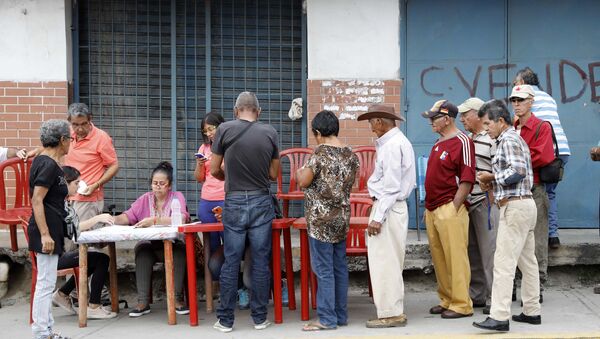 Cidadãos venezuelanos votam nas presidenciais em 20 de maio de 2018, na cidade de Barquisimeto - Sputnik Brasil
