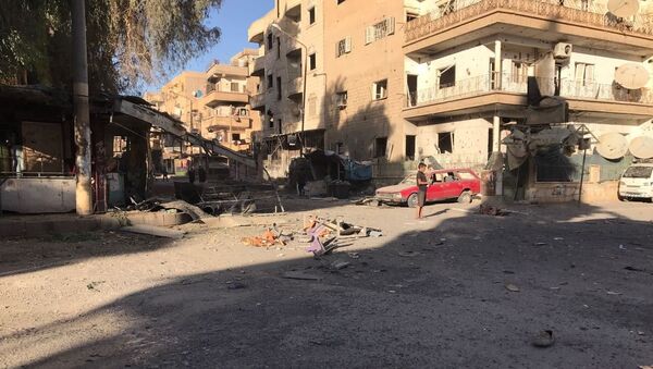 Rescaldo de ataques de artilharia em Al-Qusur, um bairro na cidade síria de Deir ez-Zor. - Sputnik Brasil