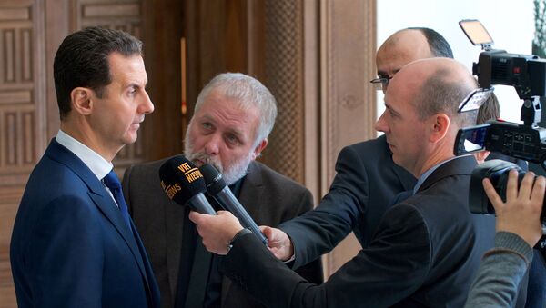 Presidente sírio Bashar Assad fala ao grupo de correspondentes belgas (foto de arquivo) - Sputnik Brasil
