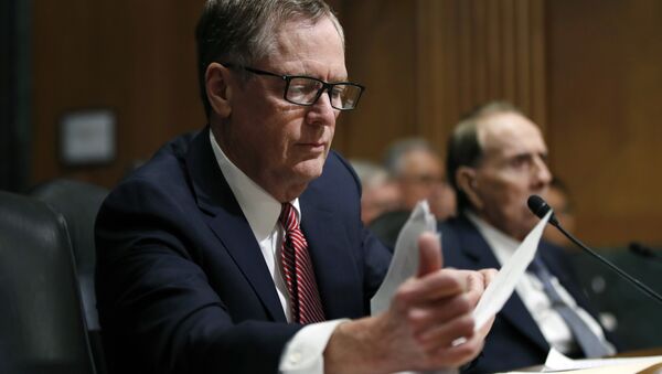 FILE - In this Tuesday, March 14, 2017, file photo, United States Trade Representative-nominee Robert Lighthizer, foreground, looks at documents during his confirmation hearing on Capitol Hill in Washington - Sputnik Brasil