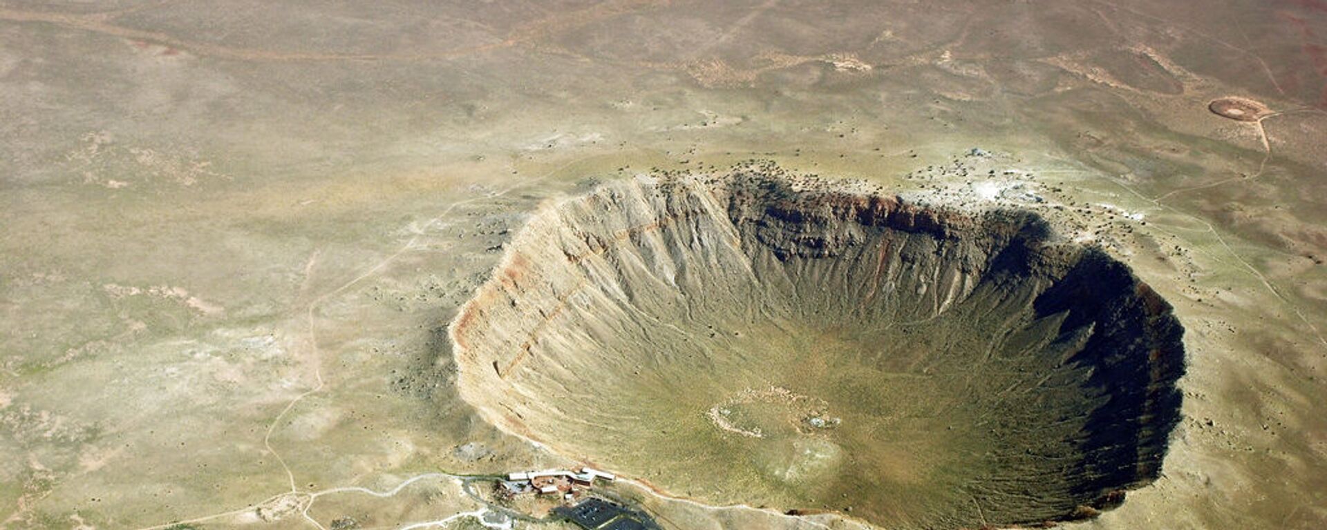 Cratera no estado do Arizona (EUA) surgida em resultado da queda de um meteorito (imagem referencial) - Sputnik Brasil, 1920, 18.04.2022