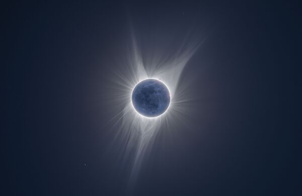 Brilho da Terra por Peter Ward. O eclipse solar observado da Terra, onde a Lua encobre o Sol deixando apenas um círculo solar à vista - Sputnik Brasil