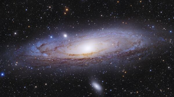 A galáxia de Andrômeda por Peeter Feltoti. É uma galáxia espiral localizada a cerca de 2,54 milhões de anos-luz de distância da Terra, na direção da constelação de Andrômeda - Sputnik Brasil