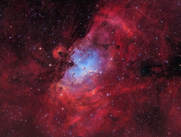 Nebulosa da Águia por Marcel Drechsler. É um jovem aglomerado aberto de estrelas localizado na constelação da Serpente à distância de aproximadamente 7.000 anos-luz da Terra - Sputnik Brasil
