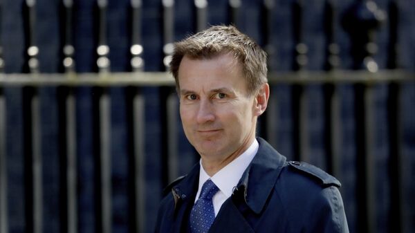 Britain's Health Secretary Jeremy Hunt arrives for a cabinet meeting at 10 Downing Street in London, Tuesday, May 1, 2018. - Sputnik Brasil