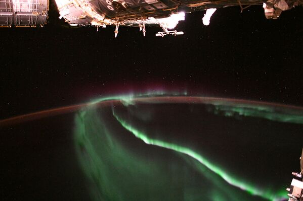 Aurora boreal vista da Estação Espacial Internacional - Sputnik Brasil