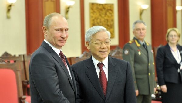 Presidente de Rusia, Vladímir Putin, y secretario general de Comité Central del Partido Comunista de Vietnam, Nguyen Phu Trong - Sputnik Brasil