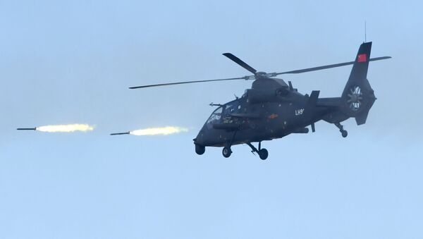 Helicóptero de choque Z-19 do Exército da República Popular da China, no polígono Tsugol - Sputnik Brasil