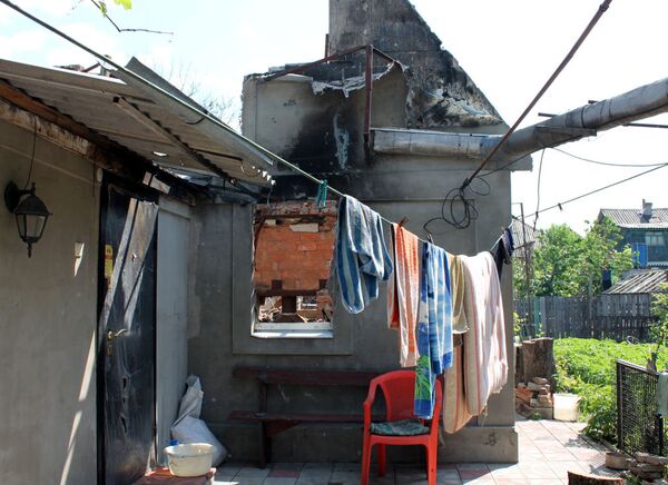 Жилой дом, разрушенный в результате обстрела Октябрьского района города Донецка - Sputnik Brasil