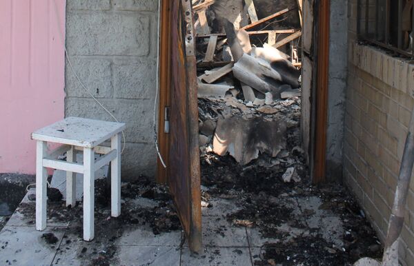 Casa destruída em Donetsk. - Sputnik Brasil