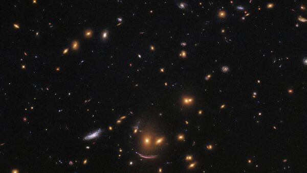 Imagem mostra área repleta de galáxias de todas as formas, cores e tamanhos, tirada do Telescópio Espacial Hubble da NASA - Sputnik Brasil