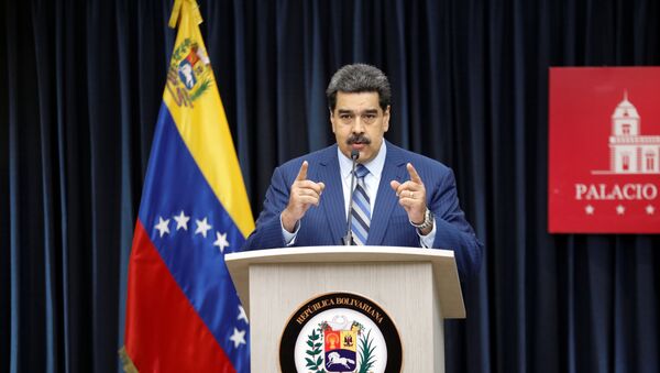 Presidente da Venezuela, Nicolás Maduro, durante coletiva de imprensa no Palácio de Miraflores em Caracas, 12 de dezembro de 2018 - Sputnik Brasil