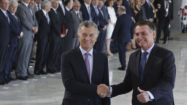 Presidente da Argentina, Mauricio Macri, e o presidente do Brasil, Jair Bolsonaro, em Brasília. - Sputnik Brasil