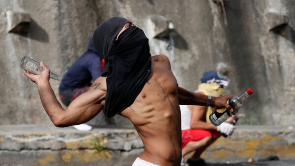 Manifestante em Caracas, Venezuela - Sputnik Brasil