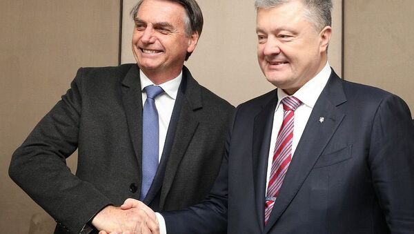 Jair Bolsonaro se encontrou com Pyotr Poroshenko em Davos, na Suíça - Sputnik Brasil