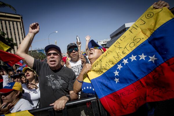 Manifestação em apoio do autoproclamado presidente interino da Venezuela, Juan Guaidó, em Caracas - Sputnik Brasil