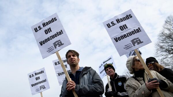 Ativistas protestam contra a intervenção dos EUA na Venezuela em frente à Casa Branca, 26 de janeiro de 2019 - Sputnik Brasil