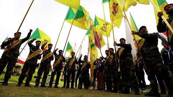 Membros da Brigada do Hezbollah no Iraque, onde o grupo libanês participa das operações para deter o avanço do Estado Islâmico - Sputnik Brasil