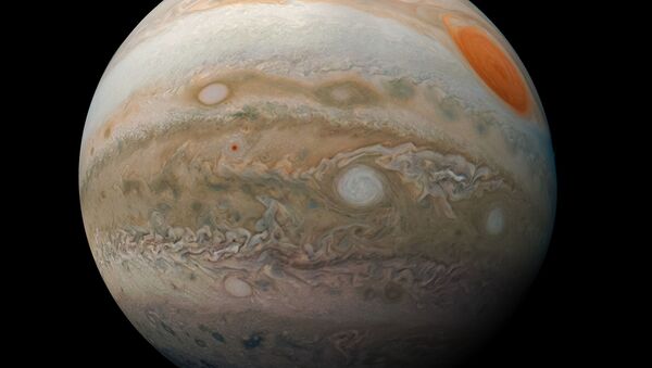 Fotografia de Júpiter tirada pela sonda Juno da NASA, em 25 de fevereiro de 2019 - Sputnik Brasil