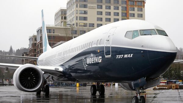 FILE - In this March 7, 2017, file photo, the first of the large Boeing 737 MAX 9 models, Boeing's newest commercial airplane, sits outside its production plant in Renton, Wash - Sputnik Brasil