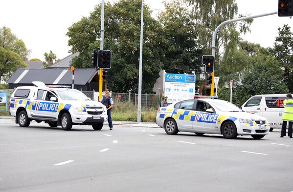 Carros da polícia na área cercada da mesquita Al Noor em Christchurch, Nova Zelândia, 15 de março de 2019 - Sputnik Brasil