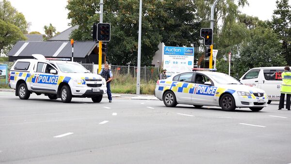 Carros da polícia na área cercada da mesquita Al Noor em Christchurch, Nova Zelândia, 15 de março de 2019 - Sputnik Brasil