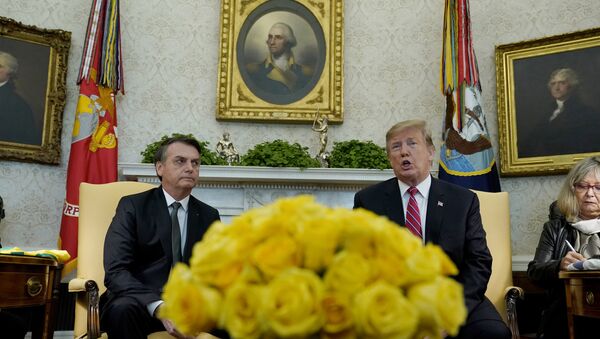 U.S. President Donald Trump speaks while meeting with Brazilian President Jair Bolsonaro in Oval Office of the White House in Washington, U.S., March 19, 2019. - Sputnik Brasil