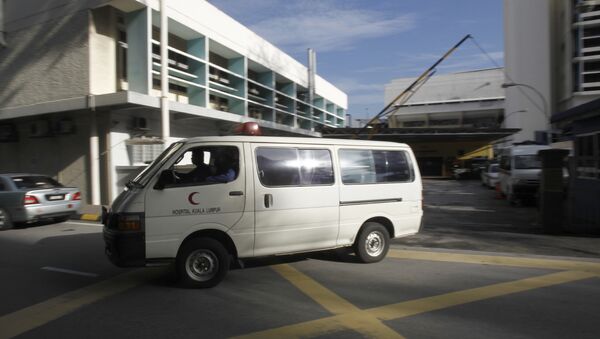 Van deixando o Hospital de Kuala Lumpur, na Malásia (arquivo) - Sputnik Brasil