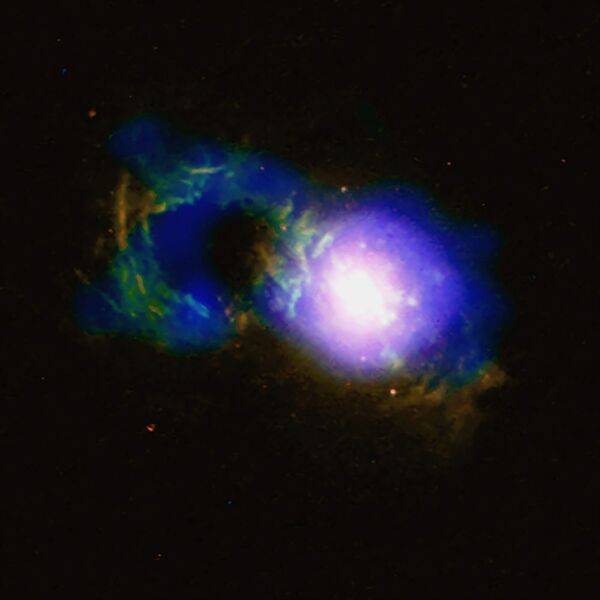 Quasar Teacup – denominado assim por ter uma forma incomum – junto com o buraco negro supermassivo SDSS 1430 + 1339 - Sputnik Brasil