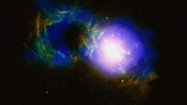 Quasar Teacup – denominado assim por ter uma forma incomum – junto com o buraco negro supermassivo SDSS 1430 + 1339 - Sputnik Brasil