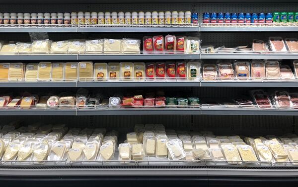 Prateleiras com produtos em um supermercado venezuelano - Sputnik Brasil