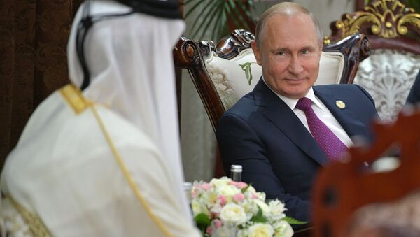 Presidente russo, Vladimir Putin, e emir do Qatar, Tamim bin Hamad Al-Thani - Sputnik Brasil